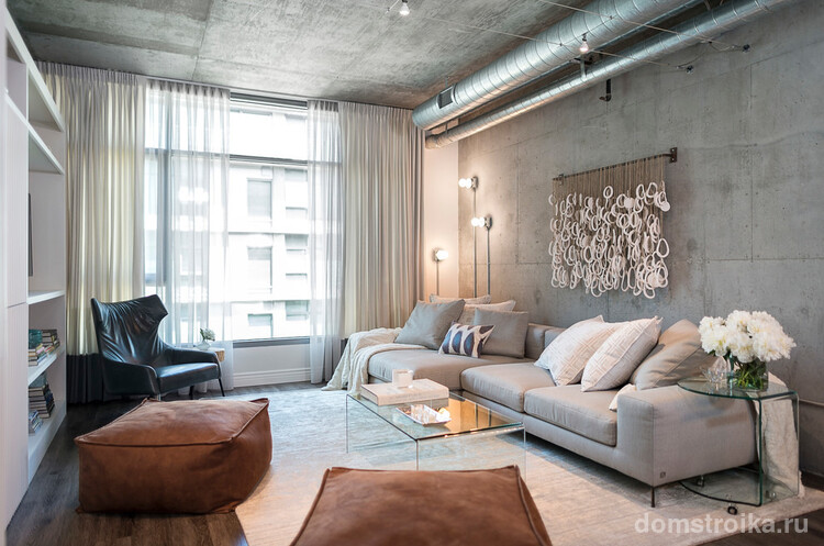 Голый бетон в интерьере современной гостиной