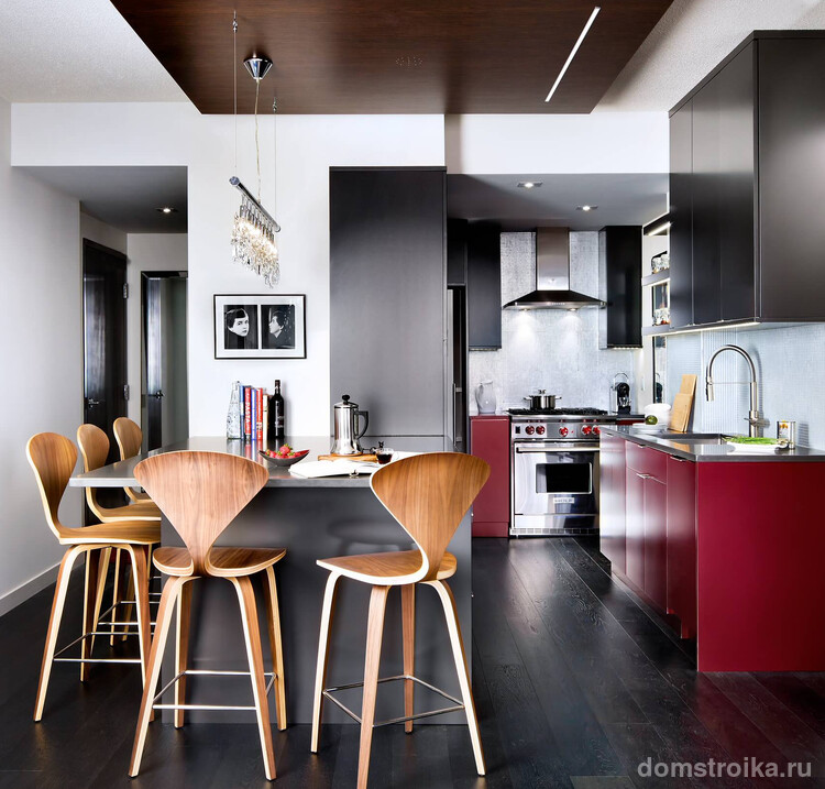 Темно-красная матовая мебель в интерьере современной кухни