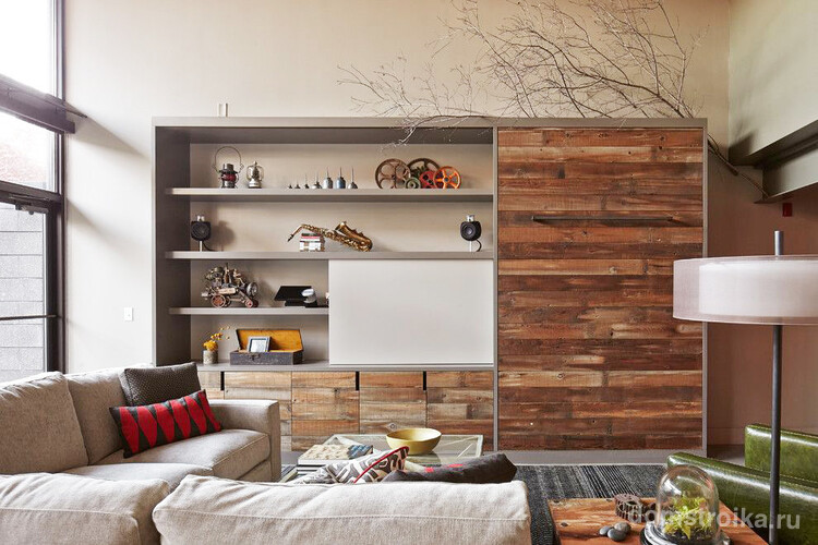 Удачная стенка поможет сэкономить пространство в вашей гостиной