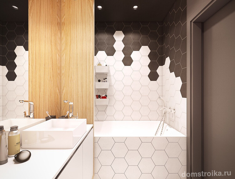 Сочетание нестандартной геометрии плитки и общая монохромная гамма позволит визуально расширить пространство ванной