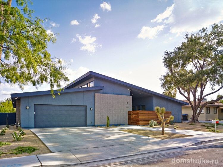 Современный дом в Лас-Вегасе стиля минимализм с большой территорией. Просторный гараж с прямым заездом для удобства использования