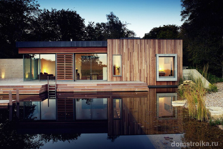 Hidden-swimming-pool-within-pond-of-Stoney-Cross-Low-Energy-House