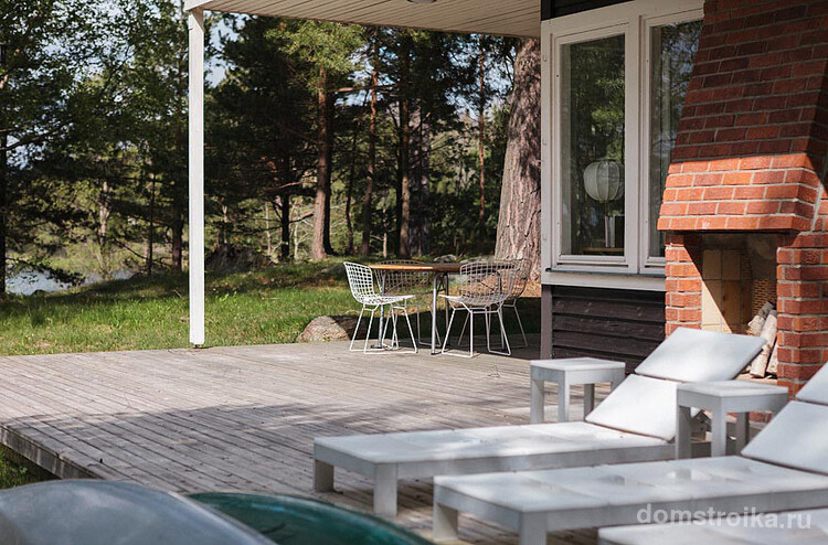 mid-century-modern-in-sweden-patio-fireplace-via-smallhousebliss