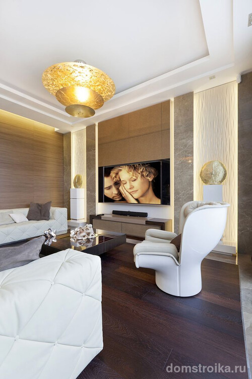 Современная гостиная в стиле арт-деко соединяет в себе самые дорогие и роскошные отделочные материалы и мебель