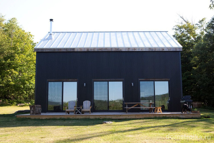 Стильный минималистичный дом в скандинавском стиле с металлосайдингом