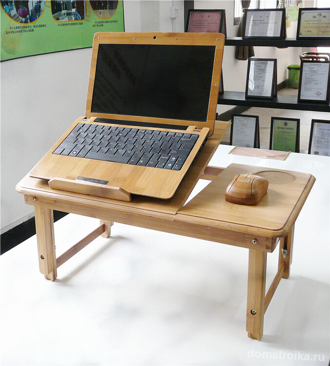 Особой популярностью пользуются деревянные столики для ноутбука