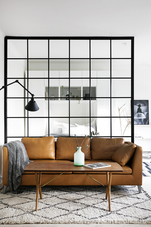 Шикарный кожаный диван в интерьере скандинавского стиля