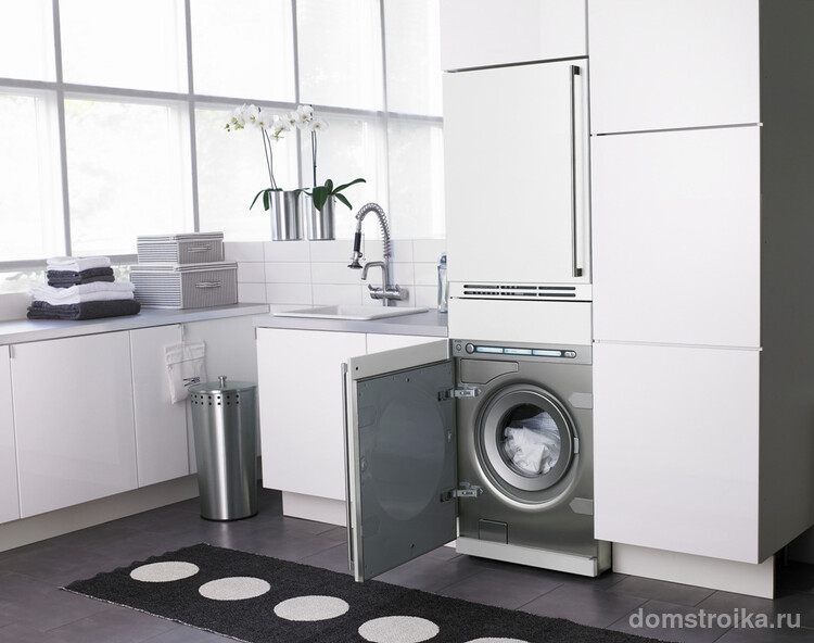 Встроенная стиральная машинка поможет сохранить общий дизайн интерьера